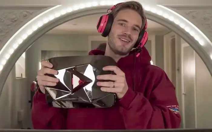 pewdiepie gives diamond play button youtube away to fan