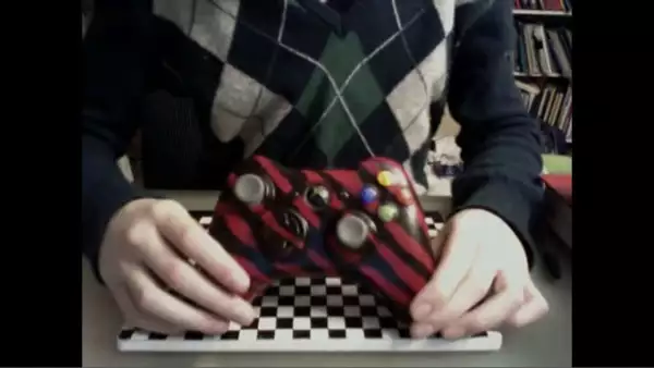 timothée chalamet, hollywood actor, youtube, gaming youtuber, red and black colours, tiger striped, xbox 360, xbox 360 controller